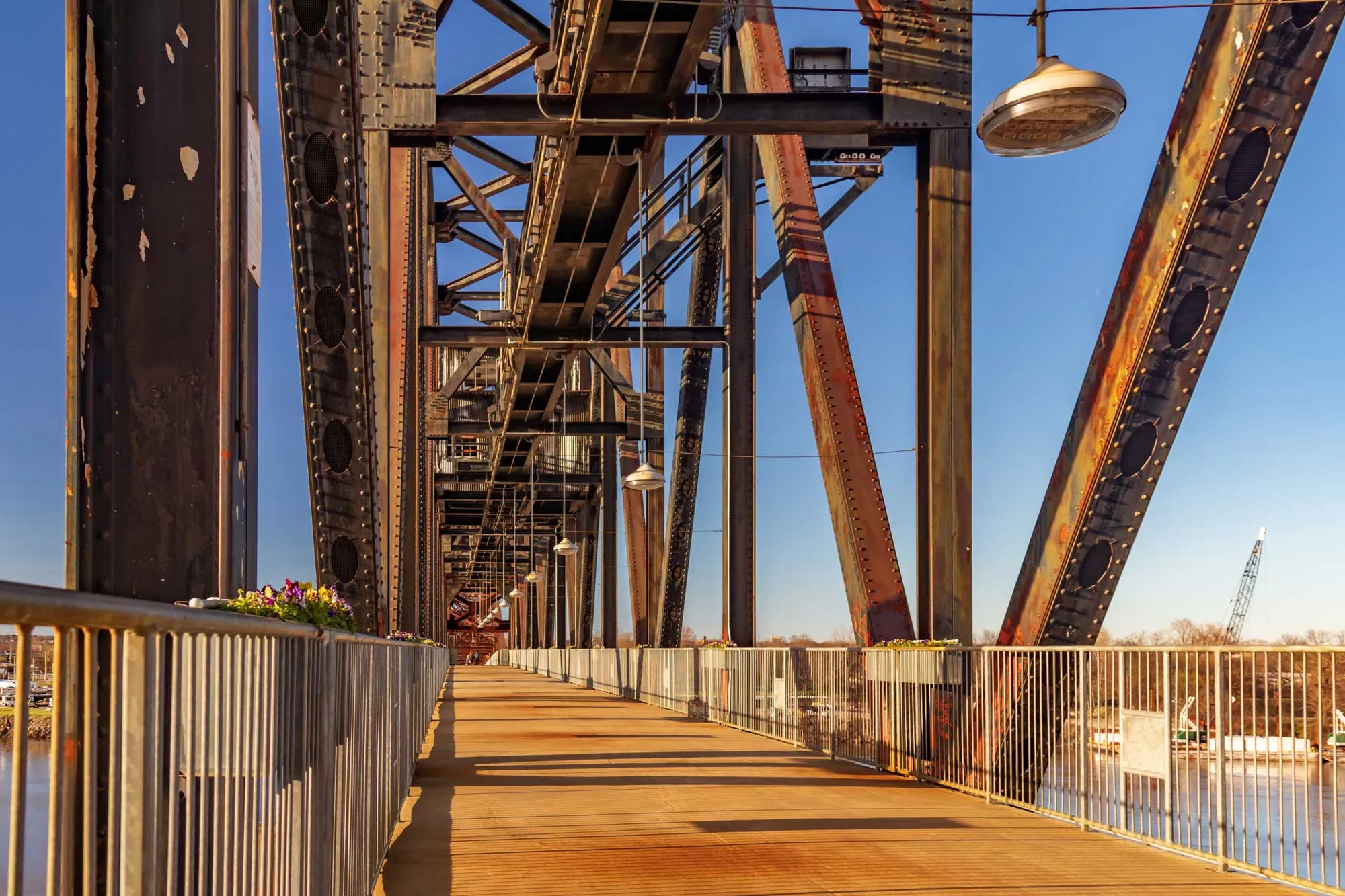 A narrow pedestrian walkway bridge